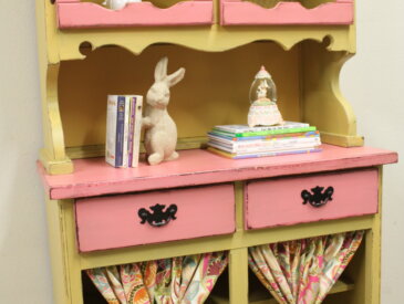pink and yellow hutch