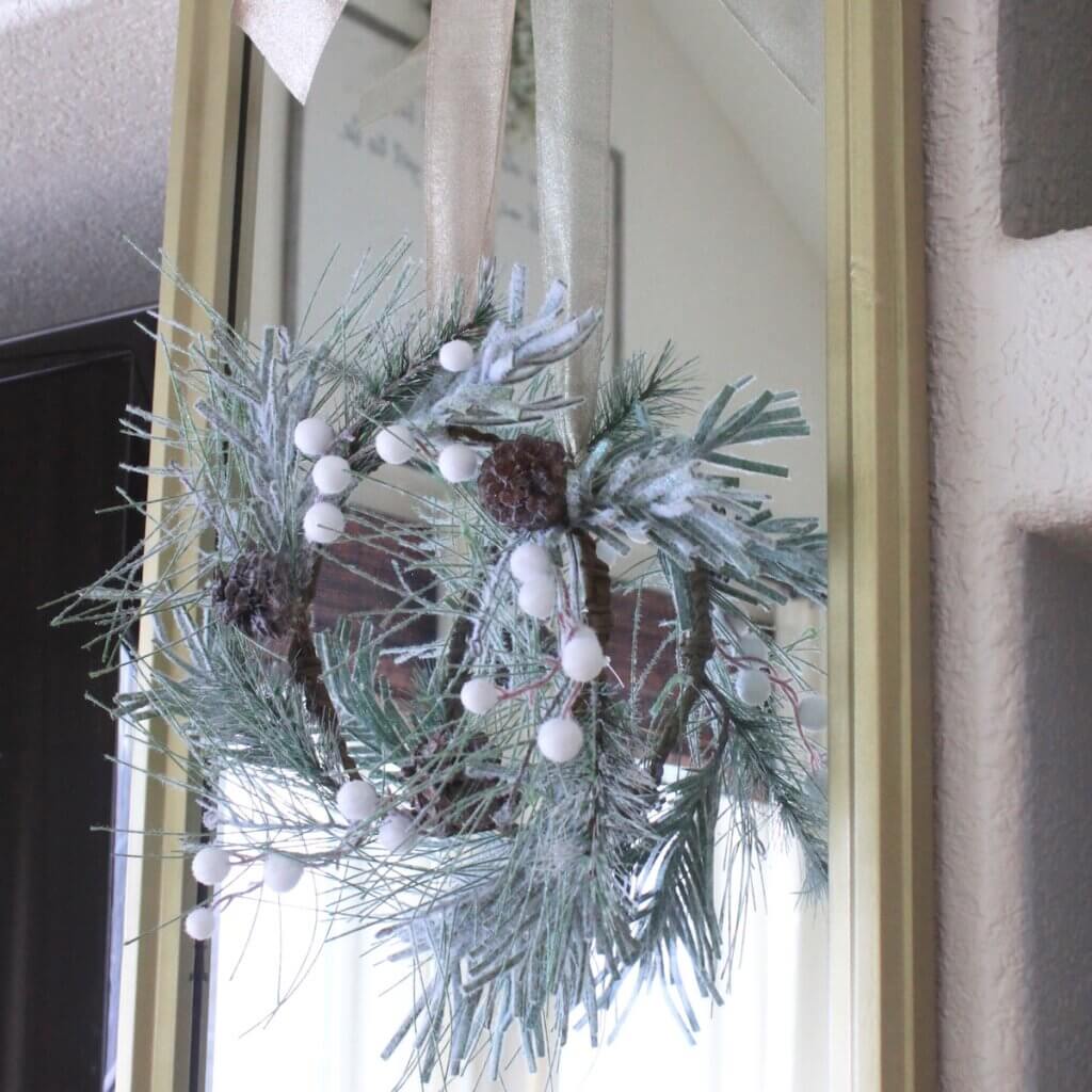 JoAnn wreath on gold mirror